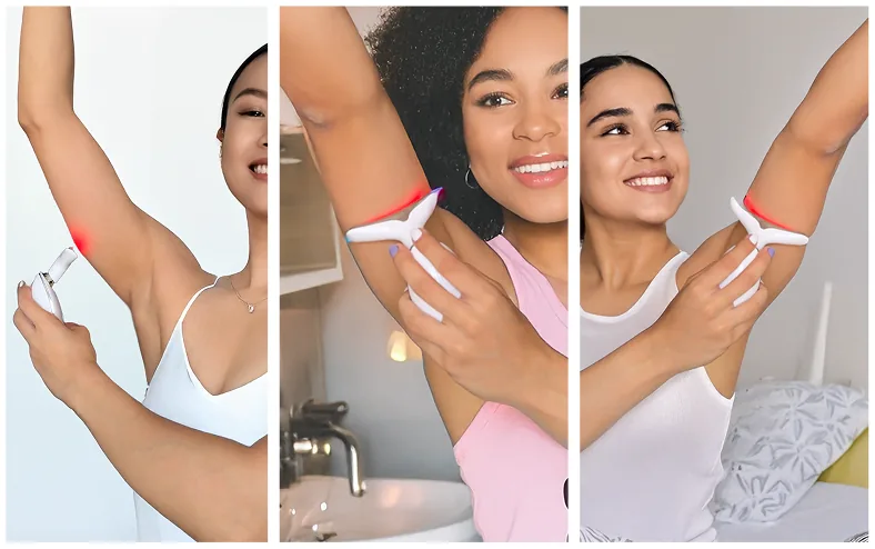 Three women using the handheld device on their upper arms